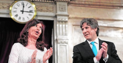 Argentina's President Fernandez de Kirchner talks to Vice President Boudou after arriving for the opening session of the 132nd legislative term of Congress in Buenos Aires